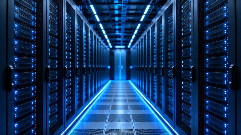Cool-blue data center aisle with rackmount servers for lights-out remote KVM access
